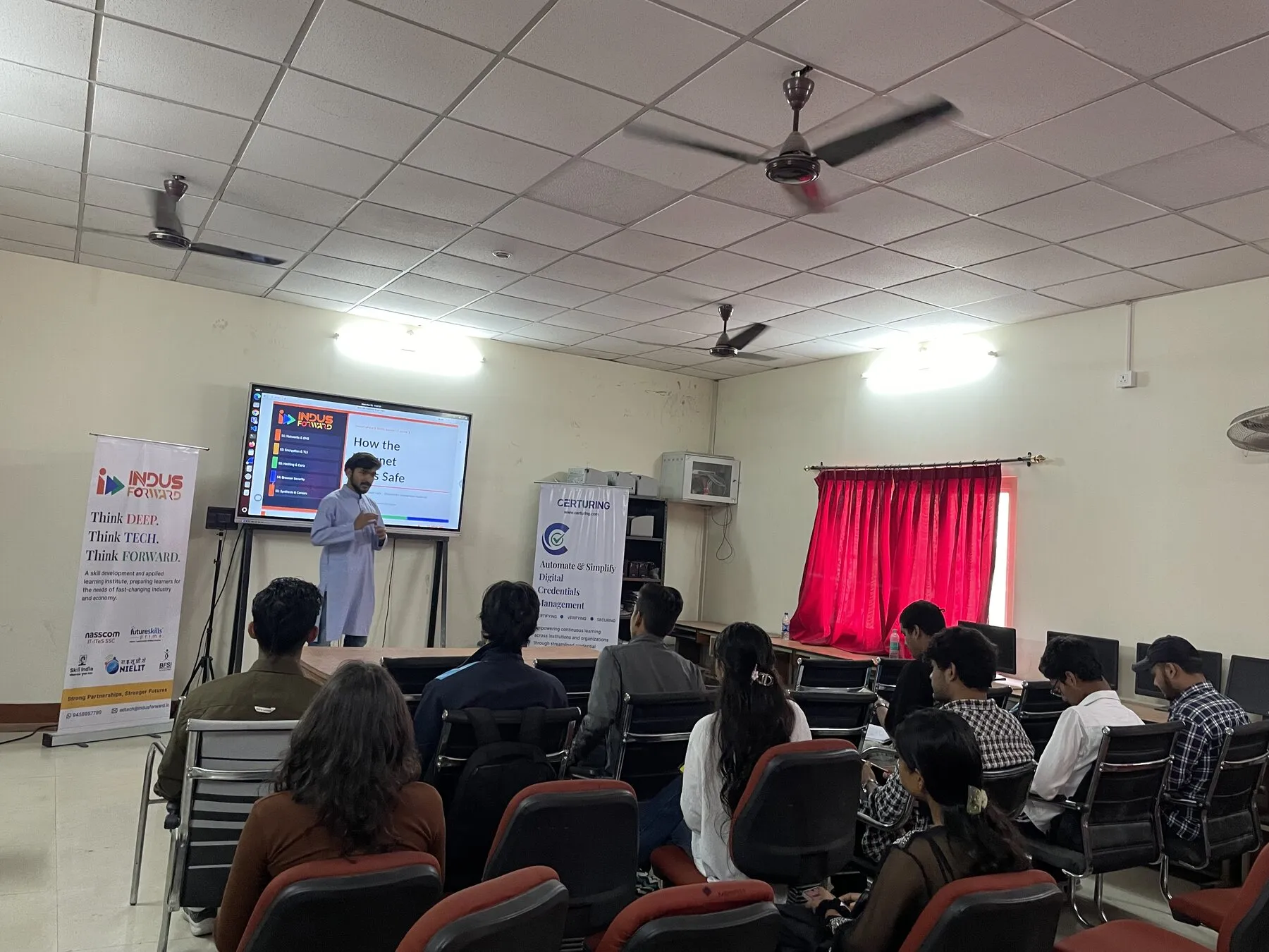Students attending a technical workshop in a college classroom.
